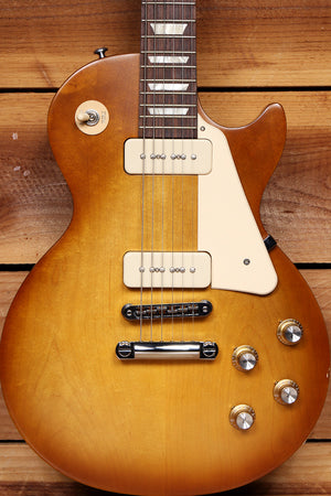 les paul tribute satin tobacco burst Gibson USA paired with a mahogany neck featuring the comfortable SlimTaper profile and traditional heel construction Gibson Les Paul Studio Guitar,